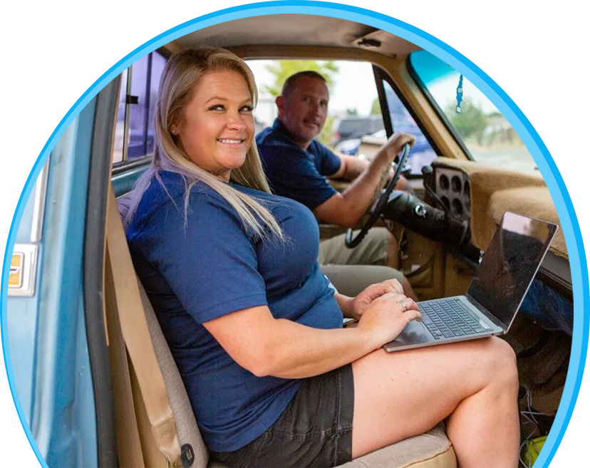 Smiling people working in vehicle