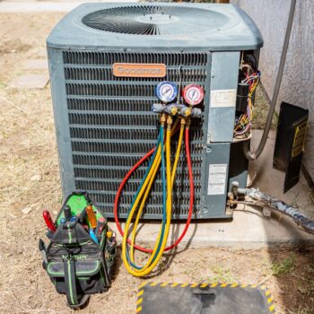 HVAC unit and tools outside