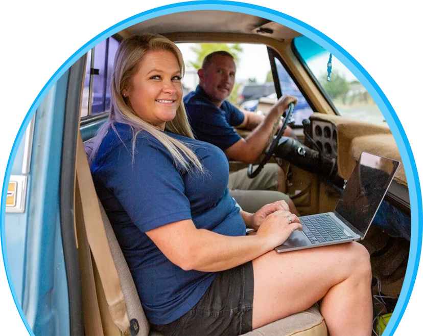 Smiling people working in vehicle